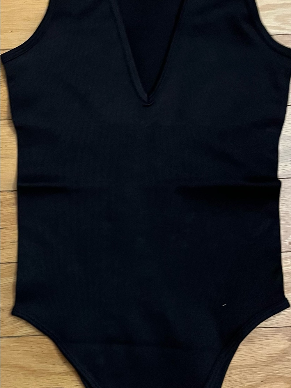 OQQ Sleeveless Black V-Neck Bodysuit - Sleek Everyday Staple